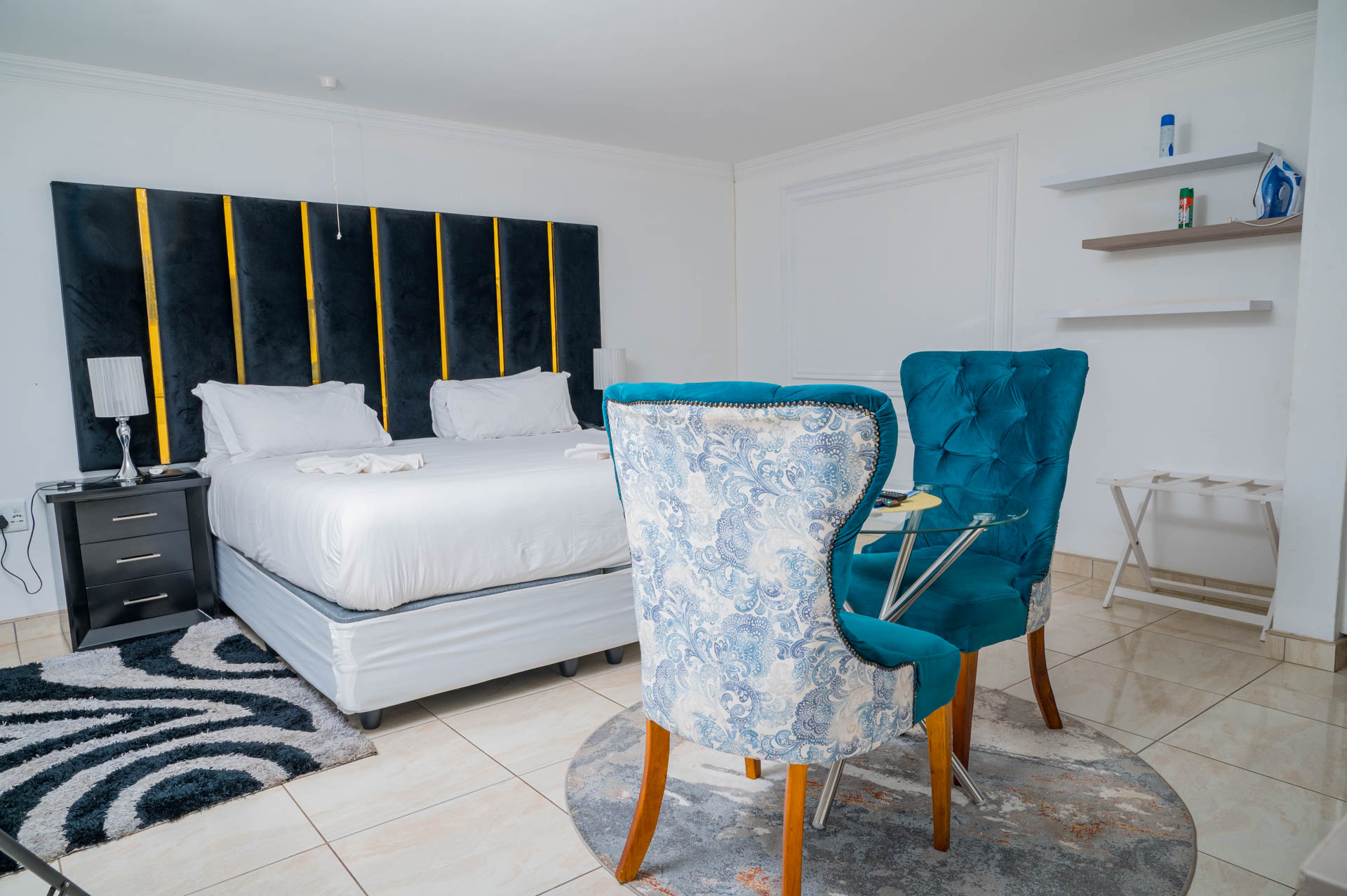 Executive Suite bathroom with modern shower and elegant finishes