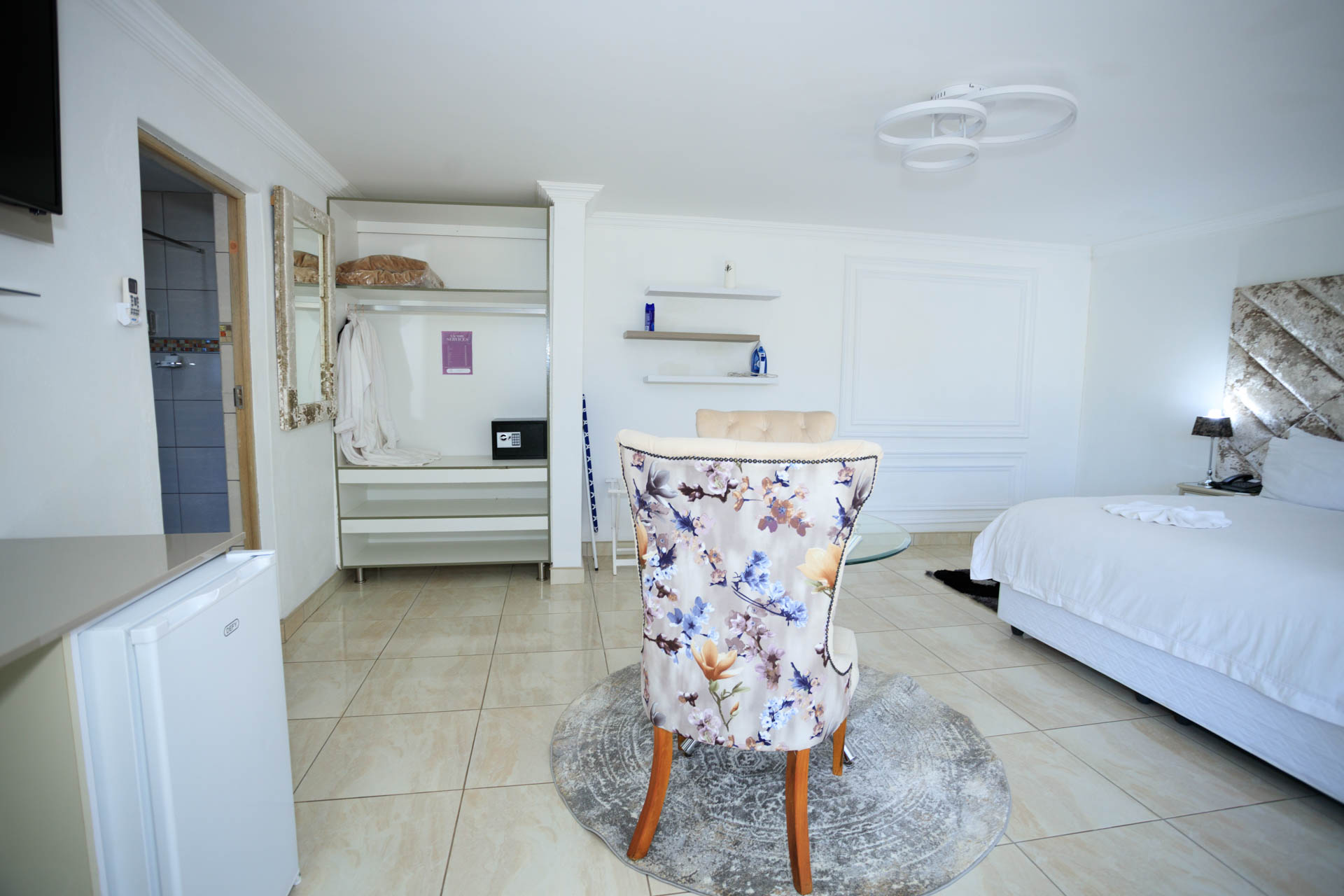 Deluxe Suite bathroom with modern shower and elegant finishes
