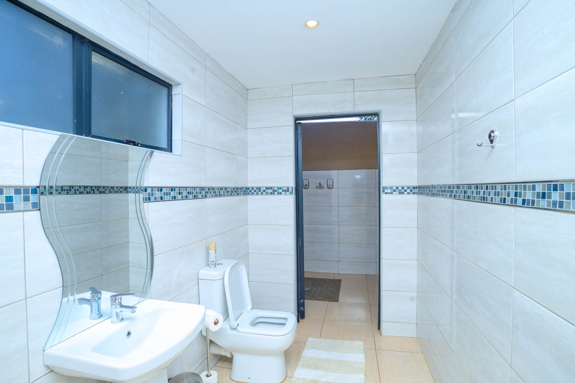 Deluxe Executive Suite balcony with scenic outdoor view at Nandoni Waterfront Resort